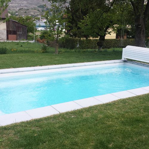 Piscine coque de 7x3 avec volet hors sol